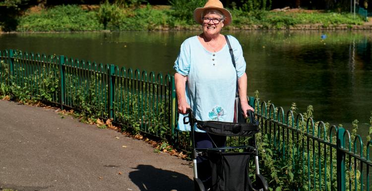 Photo by Centre for Ageing Better: woman walking with frame