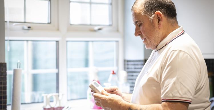 Man in kitchen