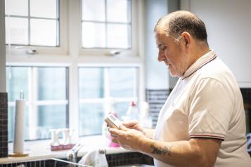 Man in kitchen