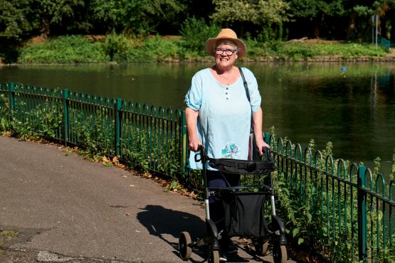 Photo by Centre for Ageing Better: woman walking with frame