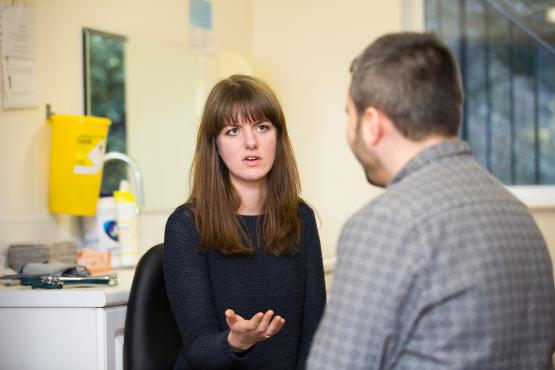 GP talking to patient