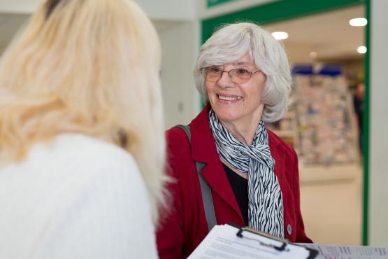 Woman sharing her views with Healthwatch staff member